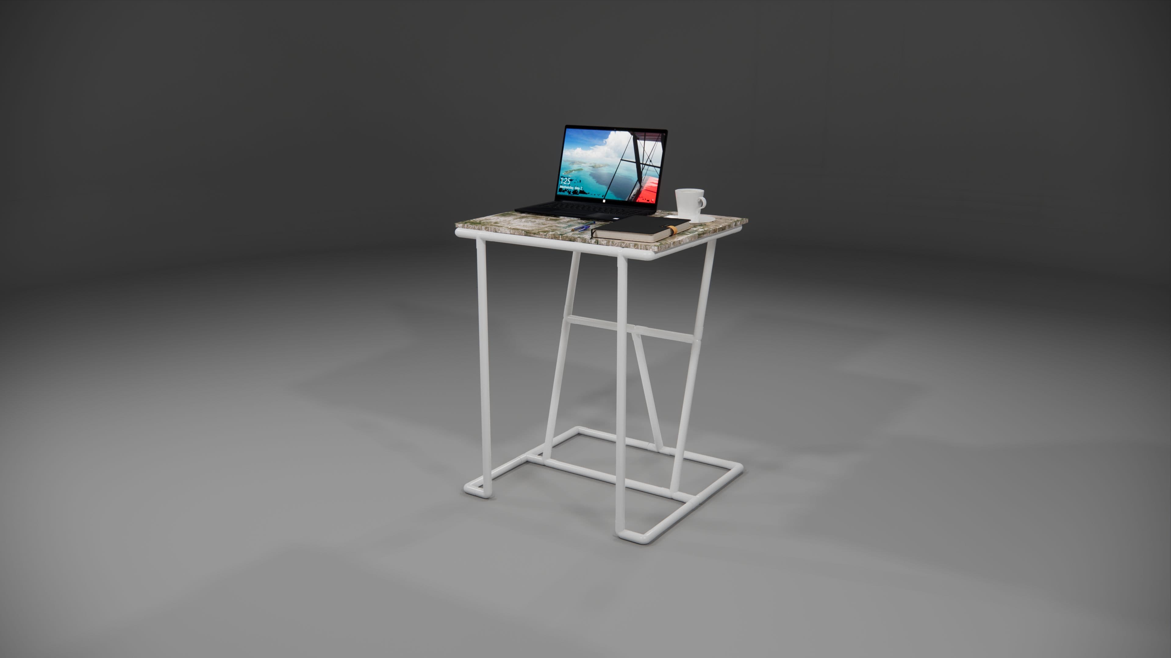Mesa de trabalho com laptop e câmera, representando criação e computação no Gemini Notebook