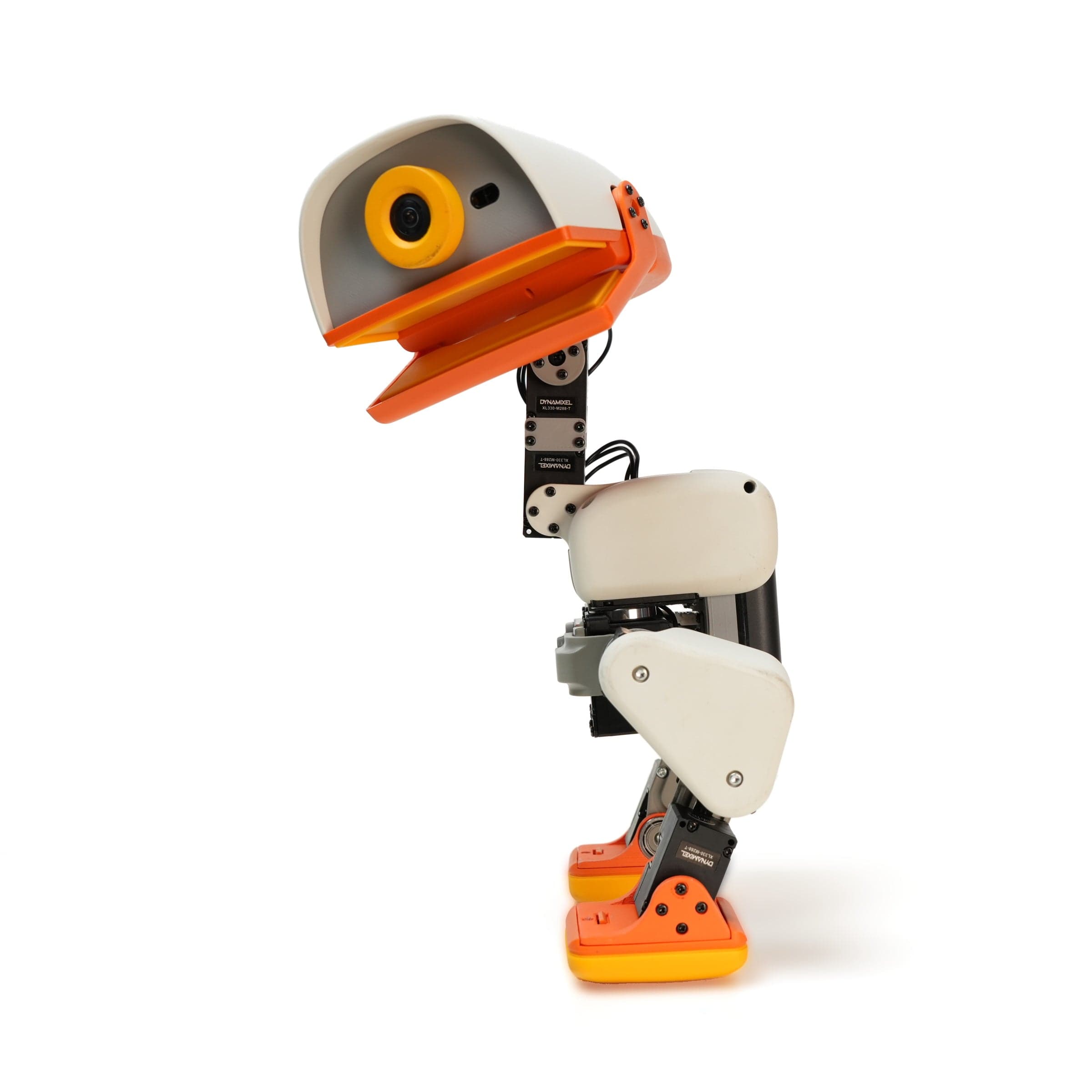 Hugging Face Microduck em perfil com carenagem creme e detalhes laranja
